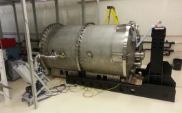 2015/09 - External support frame (ESF) assembled and positioned and cryostat uncrated and placed between the rails on blocks, awaiting rails (©SPIRou team)