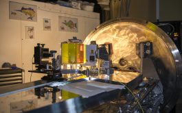 2018/02 - Overview of the SPIRou optical bench prior to the installation of the dioptric camera with the ESPaDOnS spectrograph in the background #1 (© S. Chastanet - CNRS/OMP)