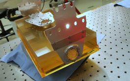 2016/11 - Bonding of the three sets of pucks & flexures on the Echelle grating (©V.Reshetov – NRC-H)